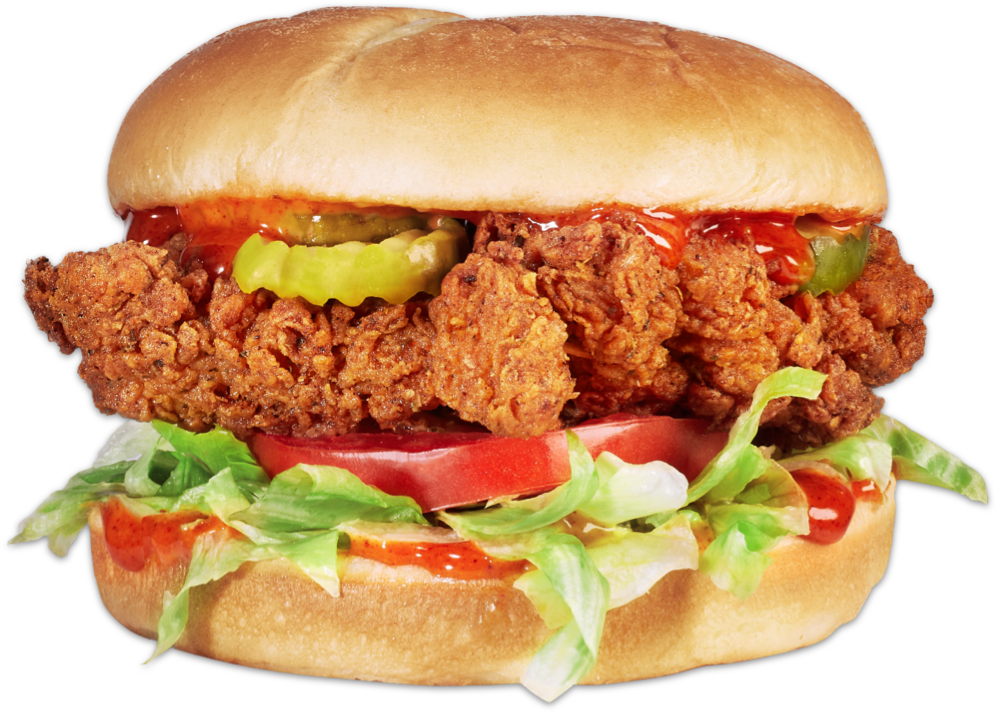A fried chicken sandwich on a black background.