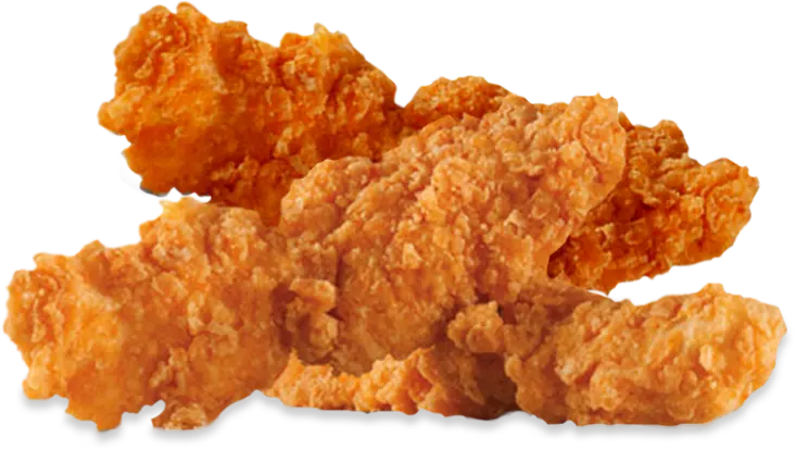 A pile of chicken nuggets on a black background.